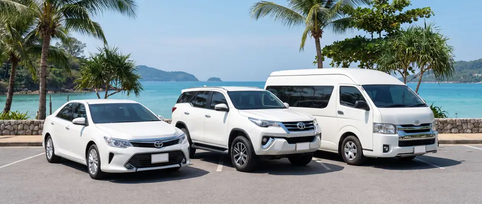 Sedan, SUV and van parked by the sea in Phuket